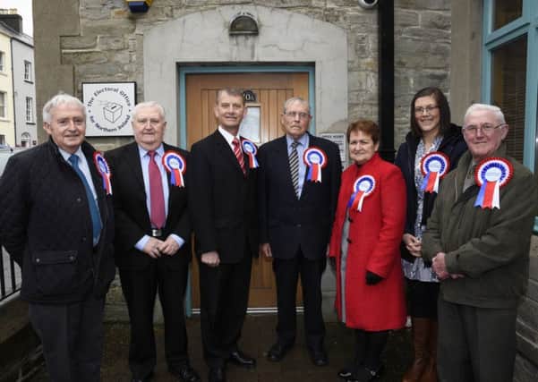 Alderman Maurice Devenney, third from left, pictured with from left, John Donnell, David Wylie, John Henry, Annette Hamilton, Sarah Hoy and William Stephenson, when he handed in his nomination papers on Friday. INLS1516-114KM