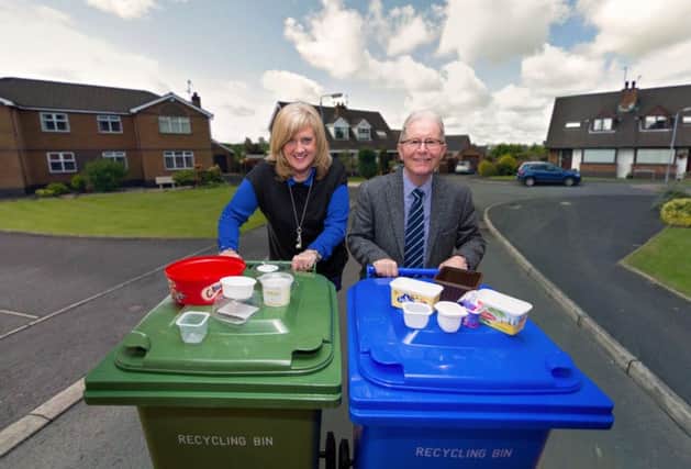 Councillor Brian Hanvey, Chairman of the Council's Environmental Services Committee and Heather Moore, Director of Environmental Services promote the addition of further plastic items that can now be recycled by households in the Council area.