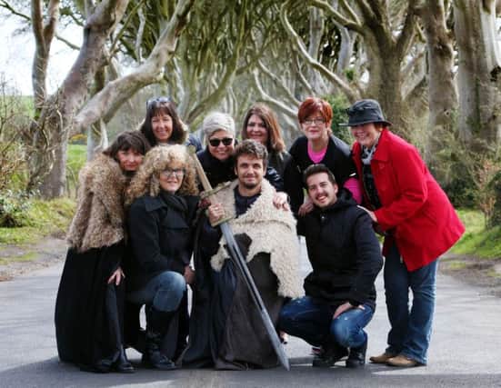 Pictured here are the tour operators enjoying the experience at the Dark Hedges. INBM17-16S