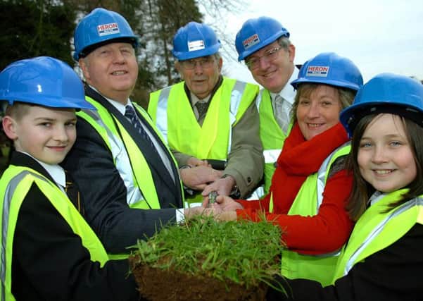 Chief Executive of the NEELB Mr Gordon Topping who performed the official sod cutting to mark the beginning of the new Magherafelt High School 8.5million Building Scheme on Tuesday afternoon of this week. Mr Topping is pictured with Mr Derek Bailie (Magherafelt High School First Principal), Mr Brian McCluskey (Present Principal), Mrs Irvonea Glassey (Chair of Magherafelt High School Board of Governors) and first year pupils Reuben Clements and Victoria Gaston.mm05-358sr Picture: SIMON ROBINSON.