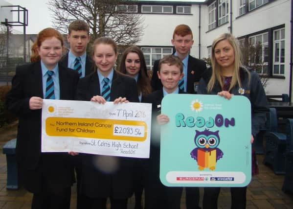 The top fundraising pupils from St Colms High School in Draperstown present Rebecca Oates Schools and Youth Fundraiser for Cancer Fund for Children with a cheque for a staggering Â£2,083.54.