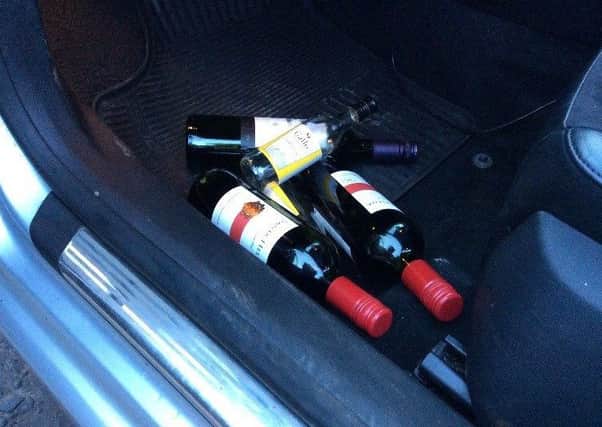 Police arrested a suspected drink driver in Cookstown at the weekend and uncovered a stash of empty bottles of alcohol in the vehicle.