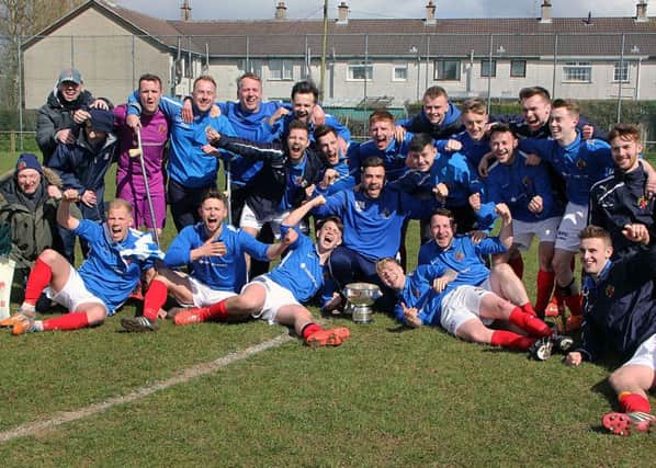 Carniny Rangers celebrate after beating Harryville Homers to win the Mortgage Solutions-sponsored Top Four trophy. INBT 17-837H