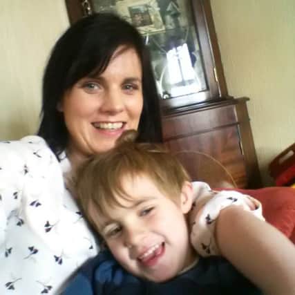 Claire O'Hanlon, pictured here with son Luke, has been appointed joint Chair/ Vice Chair of the Northern Ireland Council of Muscular Dystrophy UK