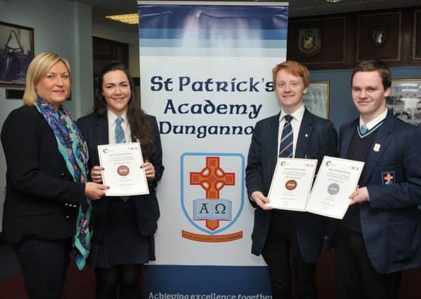 Students from St Patrick's Academy Dungannon who were awarded Silver and Bronze certificates after participating in the 48th International 2016 Chemistry Olympiad. They are Niamh Gormley, Matthew Murtagh and Eoghain Devlin. Included in the picture is Miss McElroy (Teacher).INMM1616-332