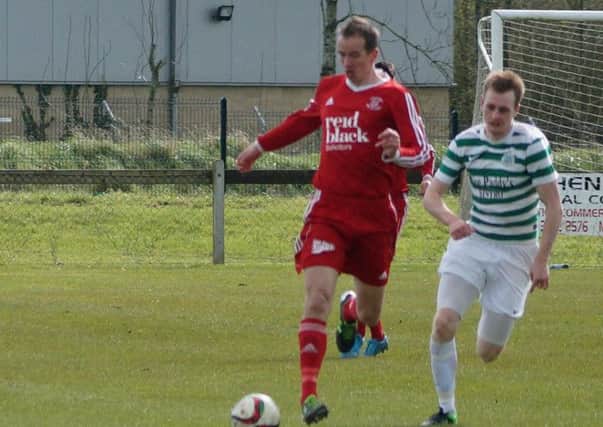 Ballyclare's Stuart McCullough brings the ball out of defence against Lurgan Celtic. INLT 16-910-CON Ballyclare's Stuart McCullough brings the ball out of defence against Lurgan Celtic. INLT 16-910-CON Photo: Tim Duff