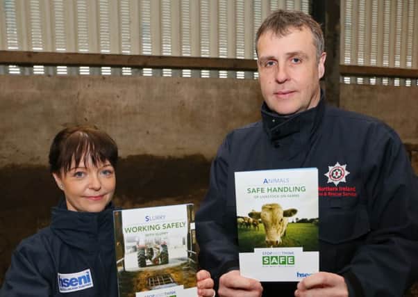 NIFRS Group Commander Fergal Leonard and HSENI Farm Safety Inspector Camilla Mackey pictured at Greenmount Agricultural College Antrim spreading slurry safety warning to the Farming Community.