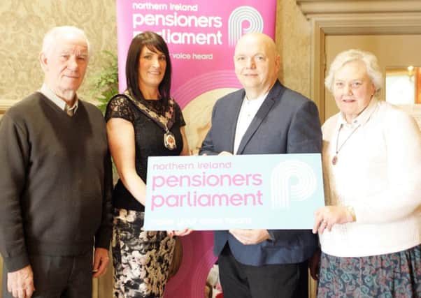 Chair of Mid Ulster District Council, Cllr Linda Dillon, with pensioners Derek Watters and Violet Little and Raymond McGarvey from Age Sector Platform