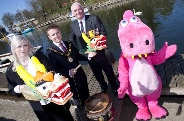 The Mayor, Councillor Thomas Hogg, launching this years Dragon Boat Challenge with Ana Wilkinson (Cancer Fund for Children), Dr Norman Walker (ABF The Soldiers Charity) and Doris the Dragon.