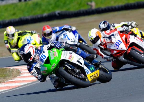 Nikki Coates 65 heads for victory in supersport race two. INLT 16-928-CON