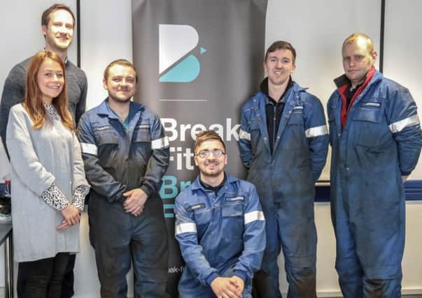 Simon Lennox and Dr Mary Jane Browne from Break Fit with Dennison Commercials staff Charlie Jackson, Andrew Campbell, David Hagan and David Baird. INNT 15-503-SO