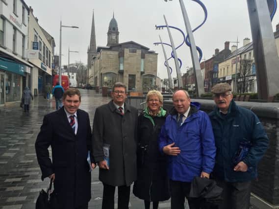 Lyle Rea pictured with party leader Jim Allister and some of his canvass team in Lisburn.