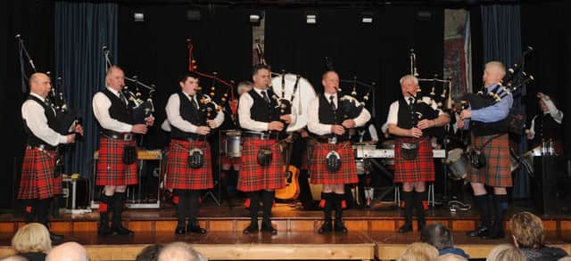 Pipe Major Jim Knox MBE (right) and Gransha Pipe Band pictured during the bands performance at their Fundraising Country Show in Dromore High School on Friday 15th April.