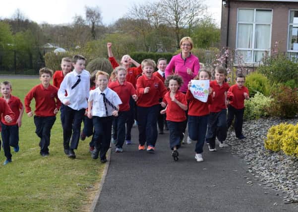 Moneymore PS pupils take part in the school's new fitness drive, the daily mile