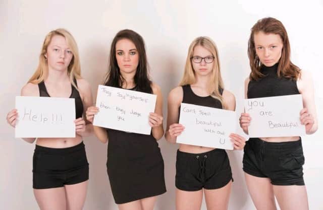Margaret Glass pictured with friends Shawneen Allen, Bethany-Kate Bayliss, Georgina Bayliss during an anti-bullying awareness phot-shoot. inbm18-16s