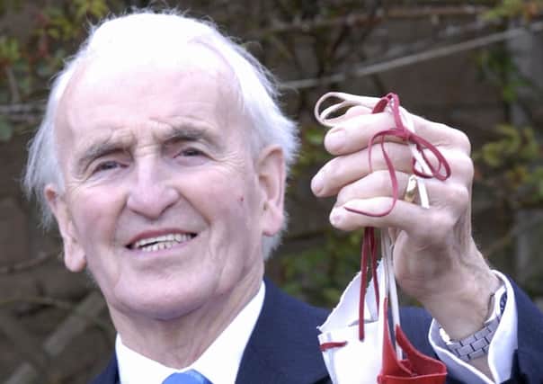 David Hull with his Maunday Money which he received from The Queen at St Patrick's Cathederal, Armagh. PT14-230.