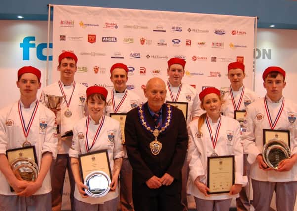 Highly commended James Gracey (sixth left) of Quail's Butcher's , Dromore, with NFMFT President Jim Sperring and (from left) Harry Smith, Premier Young Butcher 2016; James Henshaw, Erin Conroy, Stuart Rankin, Elsie Yardley, Runner-up Premier Young Butcher 2016 Dylan Gillespie and James Taylor.