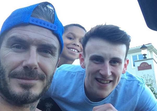 Matthew Brown, Northern Regional College Sports student, pictured with his idol David Beckham.