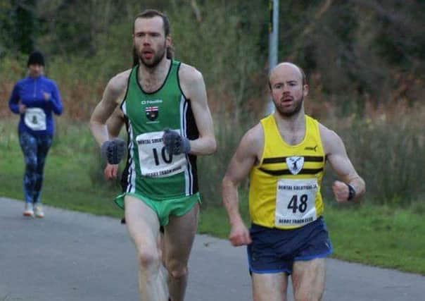 Mark McKinstry (right) in action at the Dental Soloutions 5k.