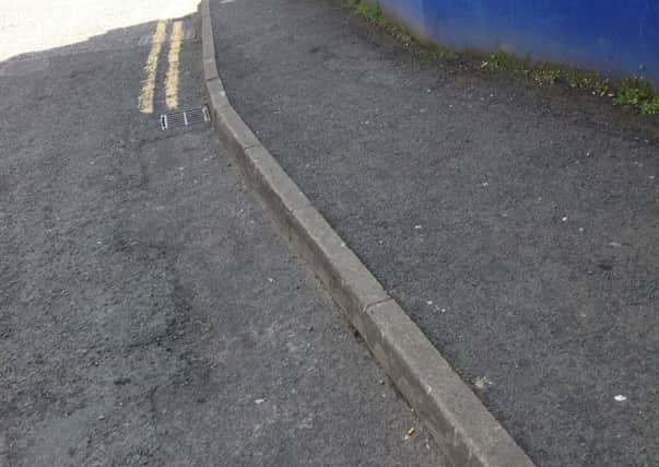 Double yellow lines extend only partially into the Gallows Street entrance to Dromore's short-stay car park.