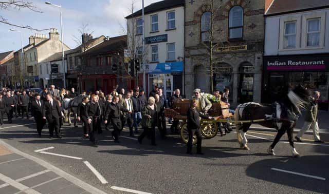 Pacemaker press 23/04/2016 Pictured are family and freinds at the funeral of legendary Romany Gypsy Arthur Gentle. Arthurs funeral has taken place from his home in Lurgan then on to  St Peters church Lurgan, Co Armagh.  The much loved great great grandfather  was well known all over Ireland and beyond.  He dealt in horses, scrap metal and hand made gypsy waggon's. At his funeral mourner's came from  as far as Spain,America, Australia,England and the south of Ireland. Picture Mark Marlow/pacemaker press