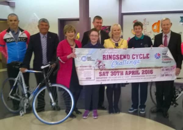 Members of Agivey Cycling Club, Billy Webb Chairperson of Northern Ireland Childrens Hospice, Moria Hickey (SDLP) Minister of Finance Mervyn Storey, Gregory Campbell (DUP) and  Mayor Michelle Knight McQuillan.