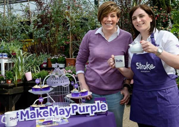 Stroke survivor Clodagh Dunlop from Magherafelt and Stroke Association's Brenda Maguire purple tea party for Make May Purple