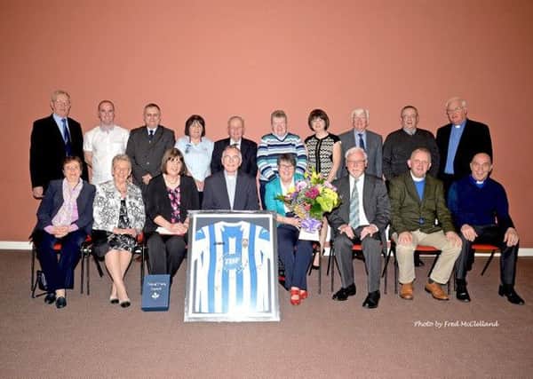 Pictured at the retirement funtion of Canon Derek Creighton, front centre, are the Glendermot Parish Church Rector's wife, Margaret, front fourth right, and  fellow clergy.  Back row, from left: Mr W Gailbraith, Mr D Dunn, Mr C Campbell, Mrs C Kelly, Mr J Moore, Mrs N Burns (Diocesan Reader), Mrs L Smallwoods, Rev K Mcloughlin, Rev A Burns, and Rev M Peoples; front: Mrs J Hanna, Mrs I Williamson, Mrs R Cooke, Canon and Mrs Creighton, Rev J Hanna, Rev I Dinsmore, Rev D McBeth.