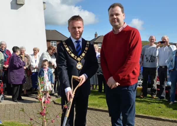 Mayor of Antrim and Newtownabbey, Cllr Thomas Hogg and Rev Alan Carson plant a tree to mark the Year of Jubilee at Abbey Presbyterian Church. INNT 16-016-PSB