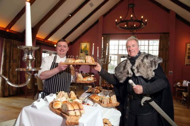 Kevin Osbourne, Executive Head Chef of Ballygally Castle Hotel and William Van der Kells of Winterfell Tours sample the new Game of Thrones Afternoon Tea which is sure to delight fans of the world renowned show as well as those who love the indulgence of a delicious afternoon treat.  The Game of Thrones Afternoon Teas will immerse people into the dark and mysterious mood of the show and are available from 2  5pm Monday to Saturday and 3-5pm on Sundays for only Â£18 per person.  For further information or to book go to www.hastingshotels.com/ballygally-castle or call 028 2858 1066.