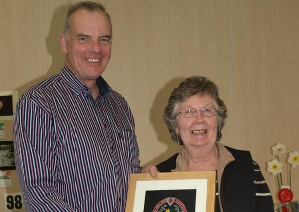 Richard McCaw, Hillsborough, winner of the prestigious 'Silver Thread' at Hillsborough Horticultural Society's recent annual Spring Flower Show,  with Society president, Jacqui Townsley.
