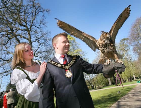 Plans take flight this week for the 2016 Irish Game Fair and Fine Food Festival to be held at Shanes Castle over the weekend of June 25-26.  Launching the event with Eddie The Eagle Owl  is Councillor Thomas Hogg, Mayor of Antrim and Newtownabbey, accompanied by Ingrid Houwers a.k.a. Ulster-Scots heroine Betsy Gray, one of the many historical characters who will be represented at the event.