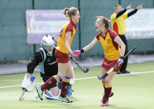 Mossley's Robyn Chambers is congratulated by Amy Jones, after she scored the winner against Priorians. INLT 17-951-CON Photo: Philip McCloy