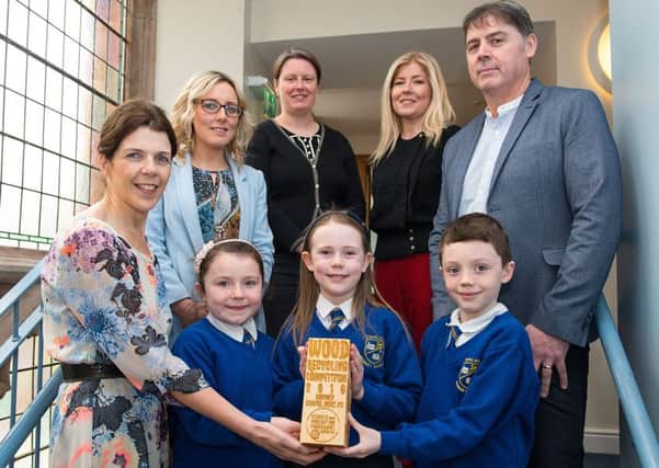 Chapel Road Primary School pupils, Alannah Kelly, Emily Armstrong and Callum Downey pictured receiving the Schools Recycling competition prize from DCSDC Director of Legacy, Oonagh McGillion. Included are Shelly McElhinney, teacher, Ruth van Ry, EcoSchools, Elsa Edwards, DCSDC and Joe Brolly, 4r's Recycling. PIcture Martin McKeown. Inpresspics.com.