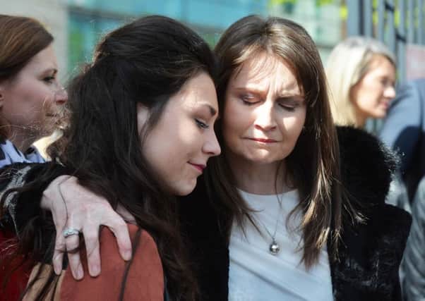 Niamh Dolan with her daughter as the family of Enda Dolan leave Laganside Court on Wednesday , The Queen's student was killed in a drink-drive incident on the Malone Road in October 2014