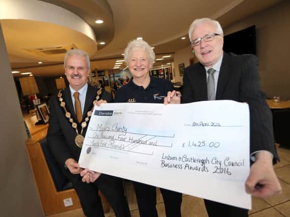 Pictured receiving a Â£1,425 donation for the Mary Peters Trust which was raised at the 2016 Lisburn & Castlereagh City Council Business Awards are: (l-r)  the Mayor of Lisburn & Castlereagh City Council, Councillor Thomas Beckett; Dame Mary Peters and Alderman Allan Ewart, Chairman of the Council's Development Committee.