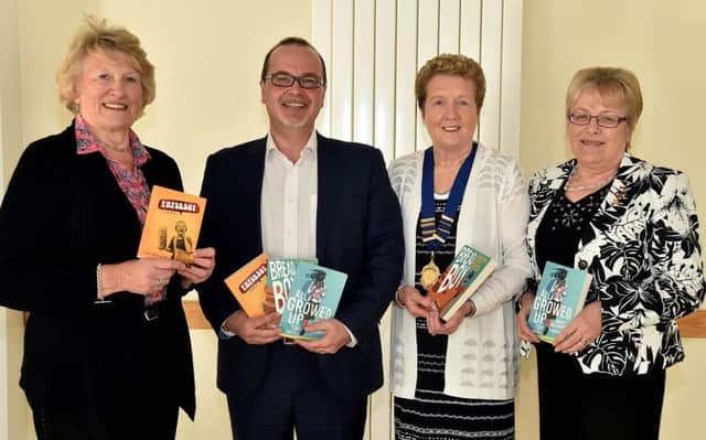 Picturede at the Moyallen Area Women's Institute Area meeting in Mullavilly Parish Hall are from left, Hazel Semple, secretary, author, Tony Macauley, guest speaker, Johanna Robinson, area chairperson, and Kathleen Verner Moyallen executive member. INPT17-210.