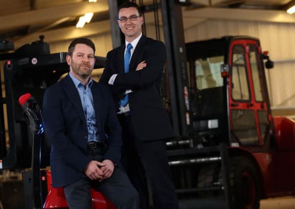 Jonathan Savage, managing director at Clearlift Material Handling, and Neil McCabe, senior investment manager at WhiteRock Capital Partners. INPT18-030
