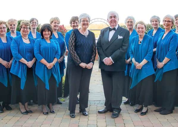 Portadown Ladies Choir with conductor Gordon Speers and accompanist Lynn Beggs.