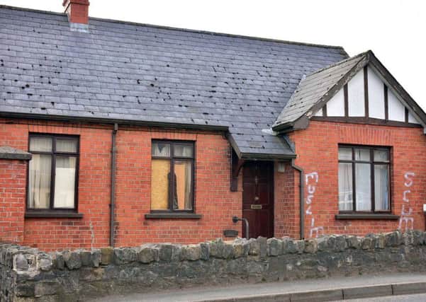 A house on Oaks Road in Dungannon was painted with racist graffiti.  Photo by Mark Winter / Pacemaker Press
