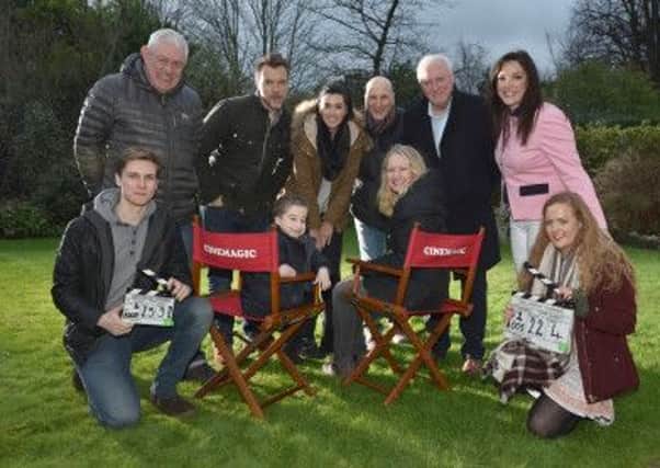 James Stockdale, seated, with production crew and fellow actors from Delicate Things, a new short film