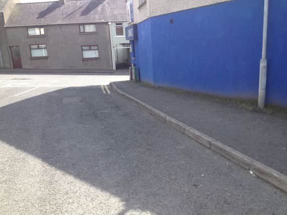The stretch of road at the Gallows Street entrance to Dromore's short-stay car-park, where drivers are accustomed to parking at the kerbside.