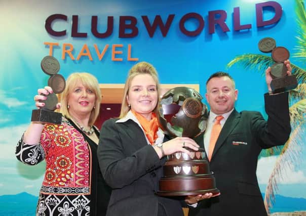 Delia Aston, proprietor of Clubworld Travel, with Victoria Patterson and  Jerome Corey from the Carrickfergus branch.   INCT 18-759-CON