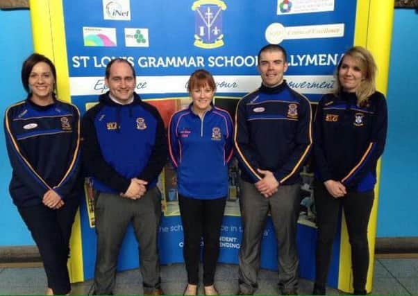 From L to R Miss Glavin, Mr Trainor, Mrs McToal, Mr McLernon and Miss Wallace.