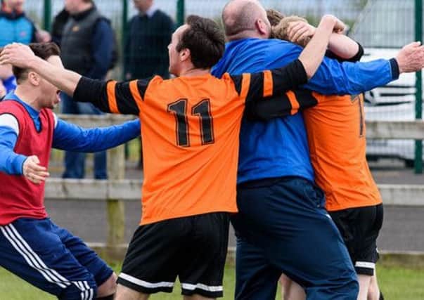 Dollingstown celebrate a late win, but delight turned to despair when other results came in.