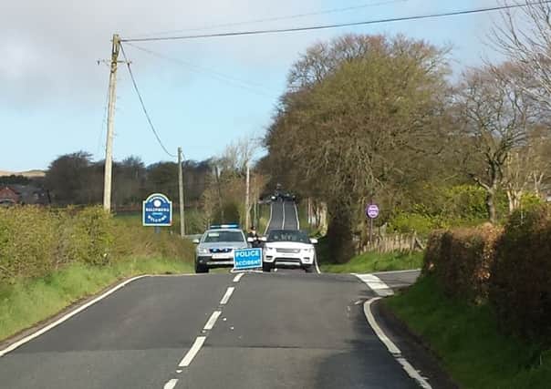 A police cordon at the scene of the fatal crash on the Collin Road.