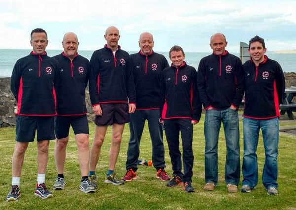 The Larne AC group who took part in Monday's Belfast City Marathon. INLT 18-925-CON