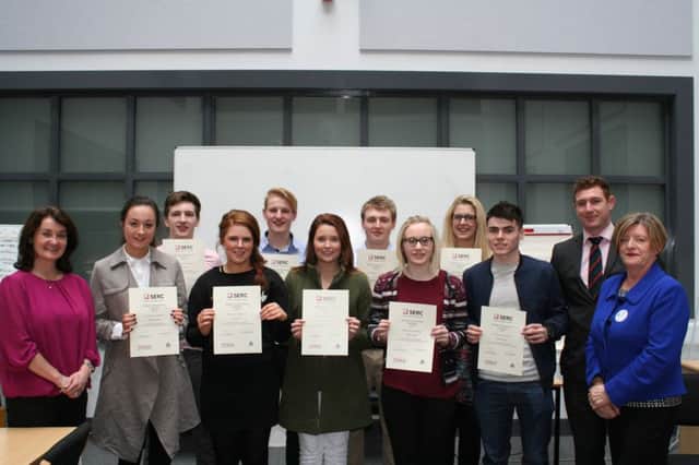 SERC Deputy Head of School Jeni McConnell alongside Foundation Degree Leadership and Management students with Tesco Recruitment Manager Lynn Livingstone and Captain John Gamble, Army Recruitment Officer for Northern Ireland at the Leadership Programme presentation ceremony.