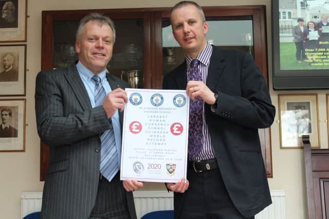 The Principal and Vice-Principal of Dalriada School, Mr. Tom Skelton and Dr. Ian Walker, are inviting the entire Ballymoney Community to the schools playing fields on May 28th to attempt to break the Guinness World Record for the Largest Human Currency Symbol. INBM20-16S