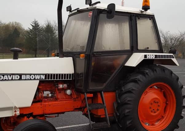 A David Brown tractor like the one seen near Meadowbank Sport Arena. Police are investigating damage to a gate on April 4